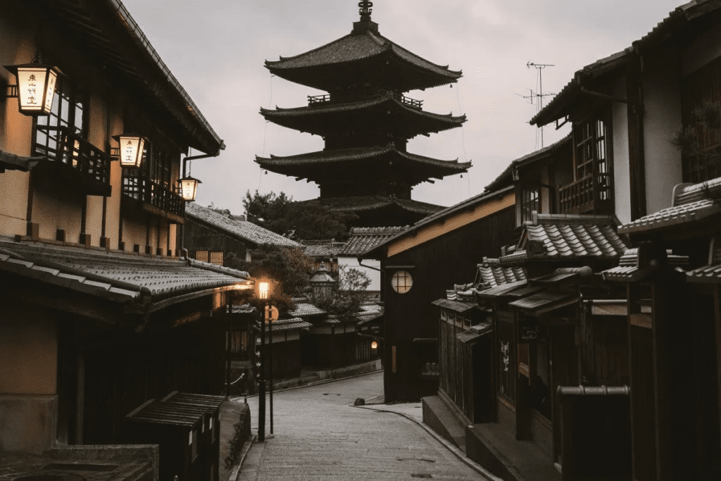 Traditional wooden buildings and a pagoda in Kyoto