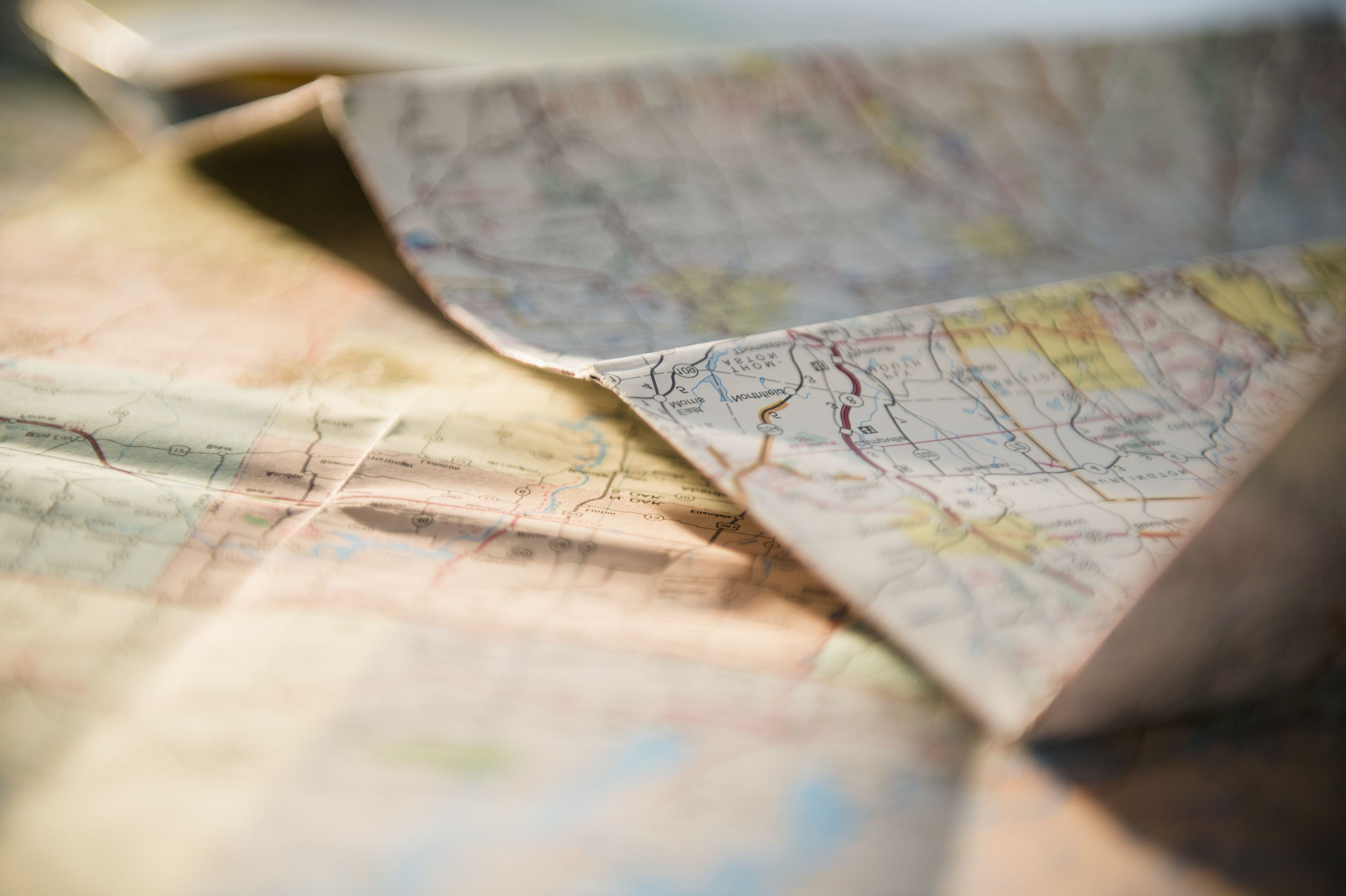 Close-up of a travel map in natural sunlight.