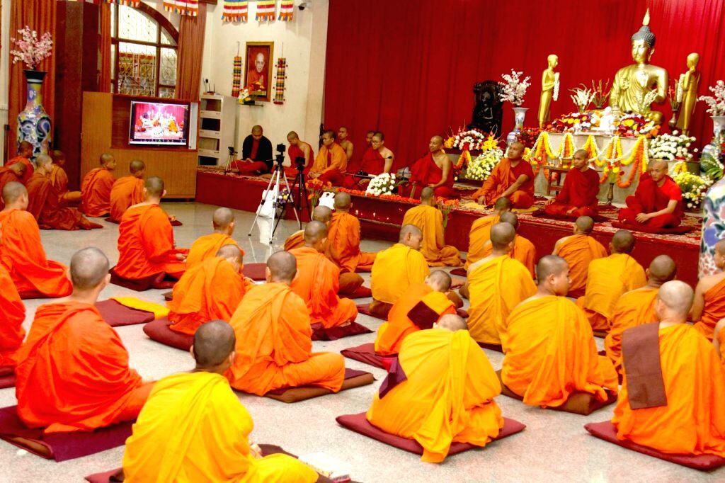 Alms giving ceremony at sunrise