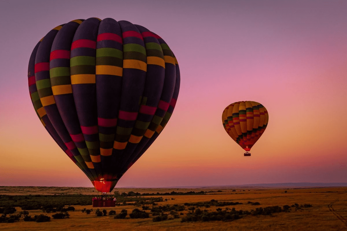 Hot air balloon soaring over the Maasai Mara