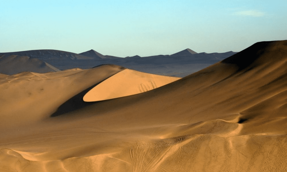 The stunning Huacachina Oasis at sunset